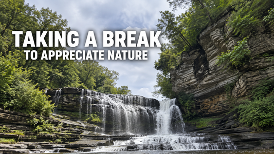 A tiered waterfall beneath a wooded rock cliff with the words Taking a Break to Appreciate Nature.