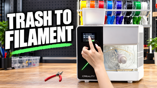 Creality filament maker with a hand operating its touchscreen and the words Trash to Filament.